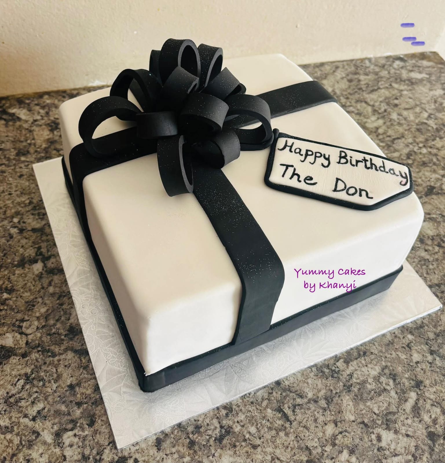 Luxurious white and gold birthday cake